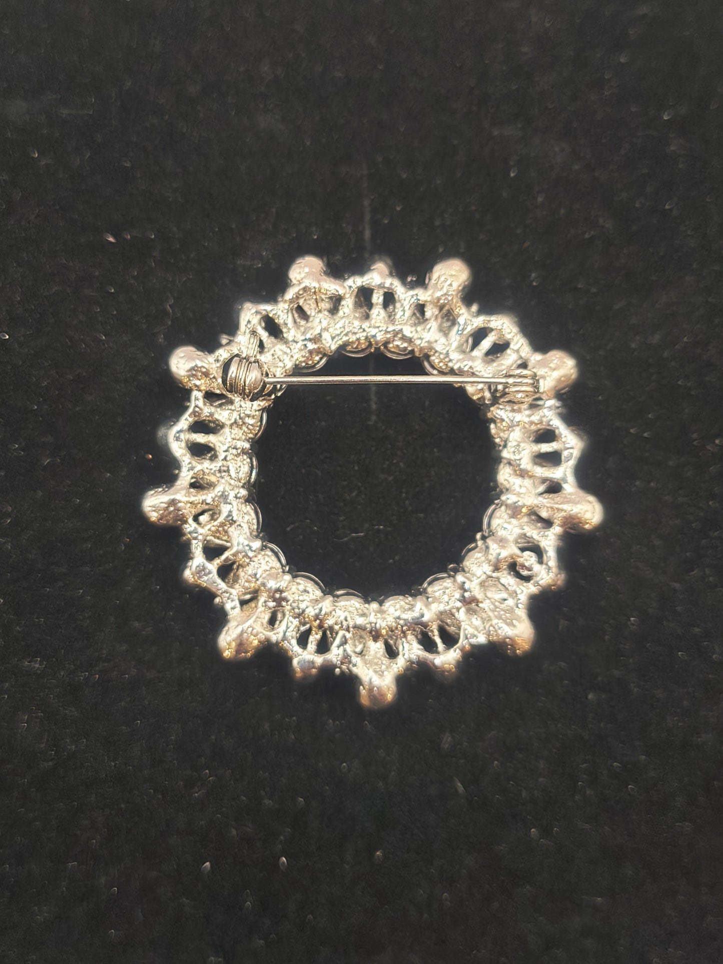 Pink vintage ringed brooch