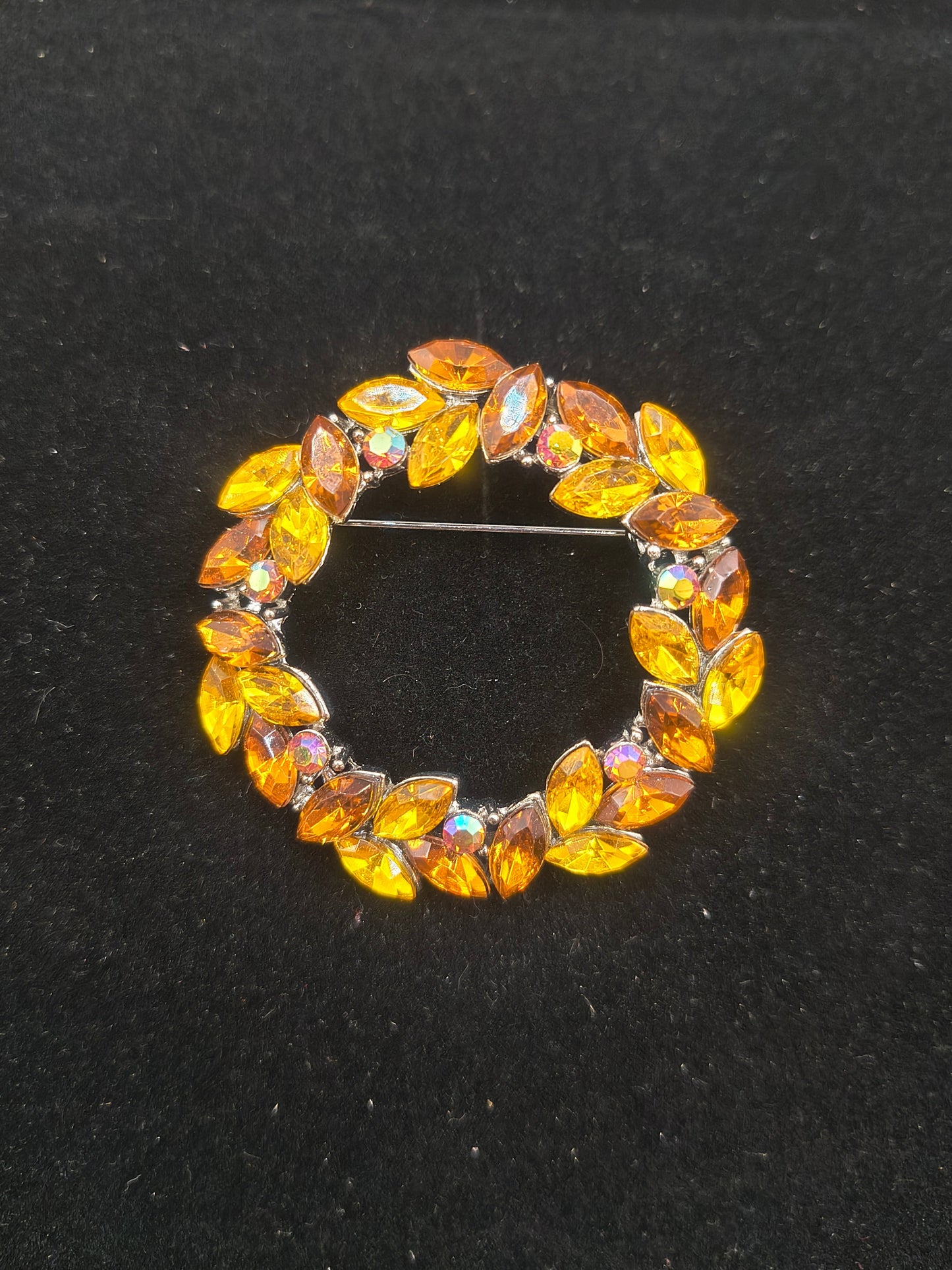 Orange vintage ringed brooch