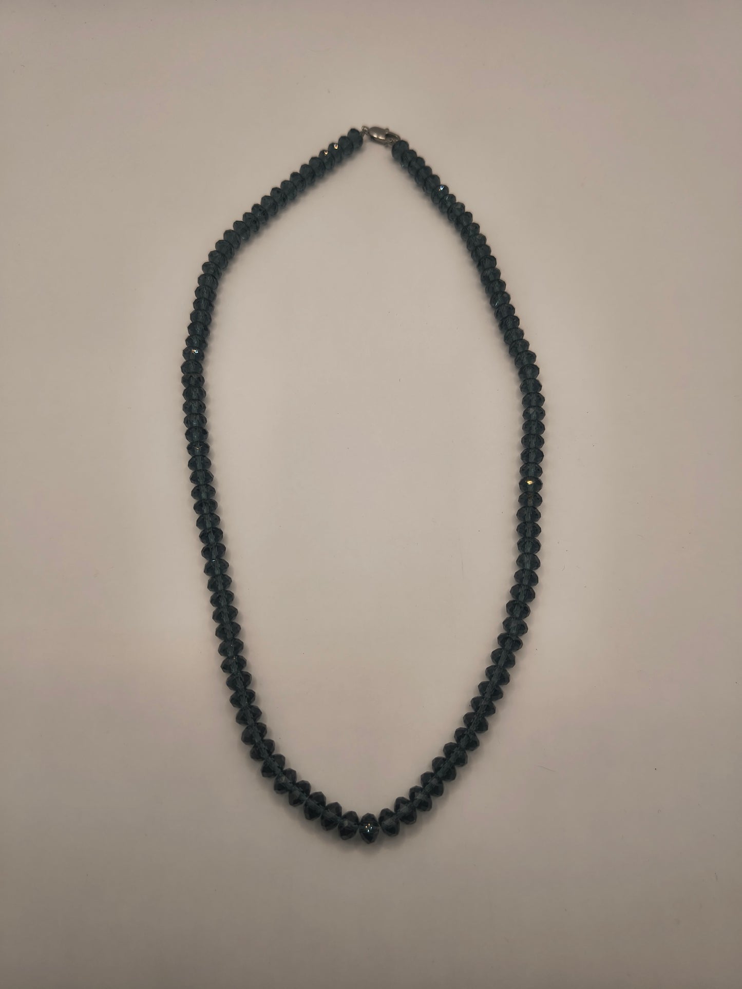 Grey bellatrix cut glass necklace
