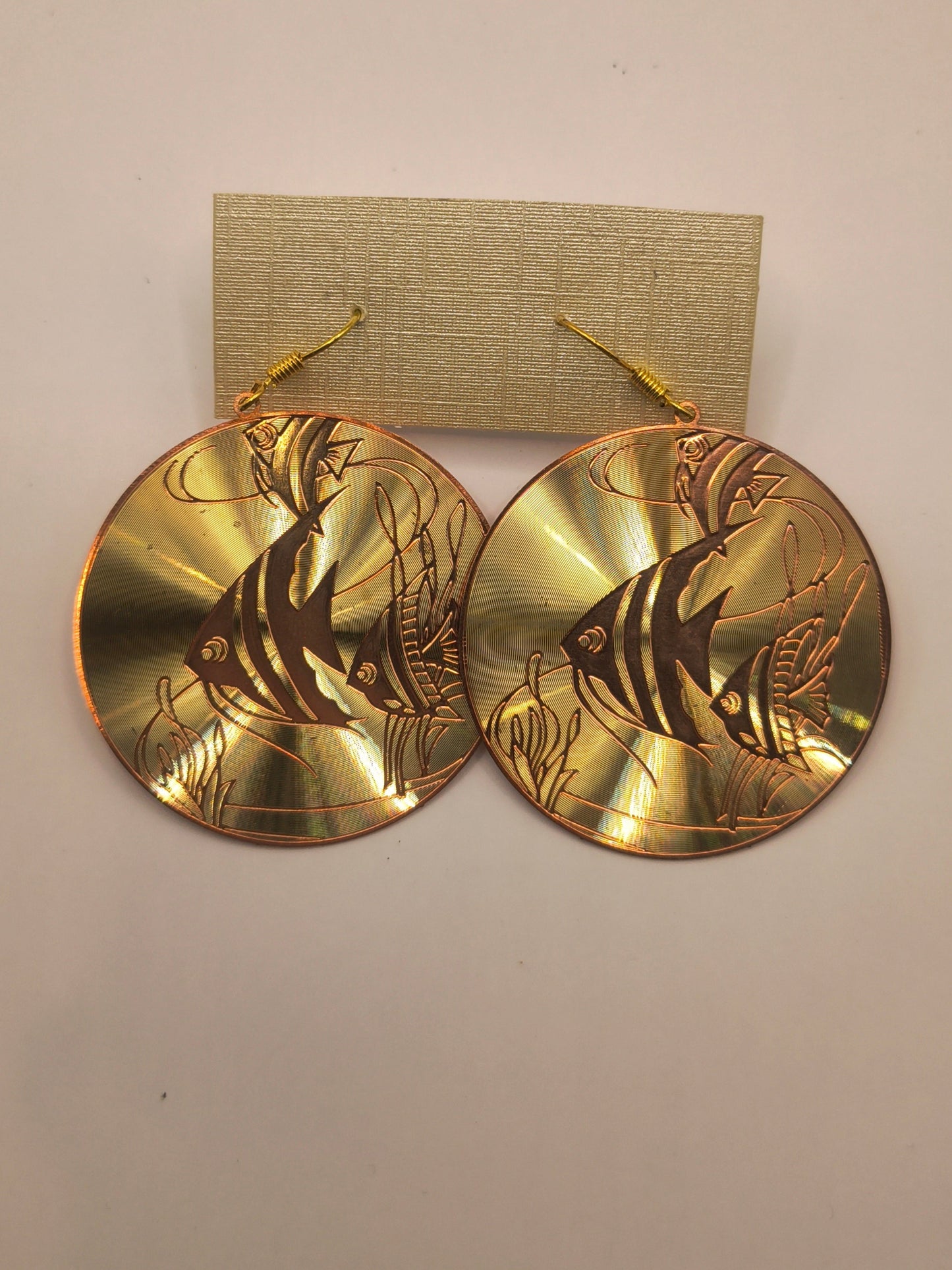 Laser etched fish earrings